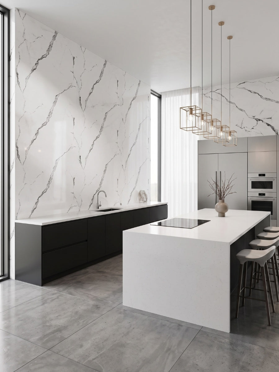 Calacatta Manhattan PVC marble wall panels with gray veining installed behind black cabinets in a modern kitchen
