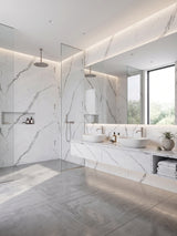 Waterproof Calacatta Manhattan PVC marble sheets lining a glass shower and double-vanity bathroom