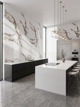 Calacatta Oro Gold marble-look wall panels forming a dramatic white and gold veined backdrop in a modern kitchen