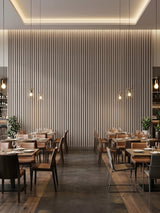 Restaurant dining room with a full-height Nordic Birch fluted wall panel feature wall
