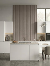 Nordic Birch fluted 3D wall panels installed as a tall kitchen feature above the island