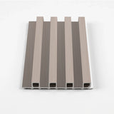 Cedar Oak WPC fluted wall panel sample in a pale taupe wood-grain finish