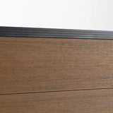 Close-up of walnut wood-grain composite fence boards beneath a black top rail