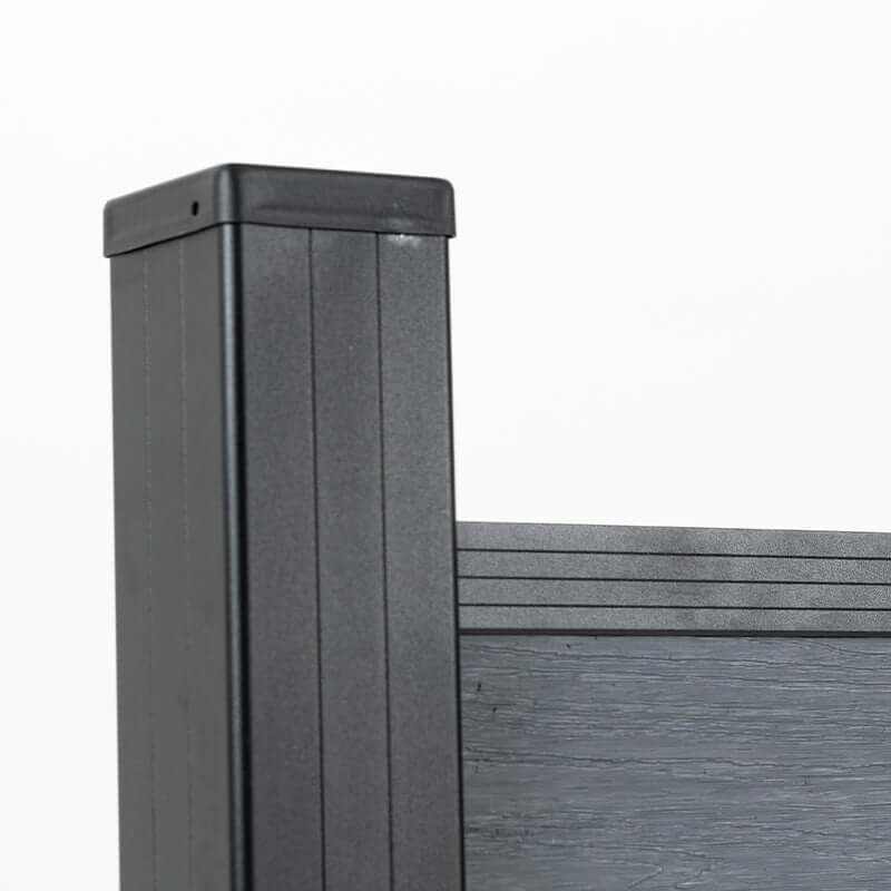 Side detail of a capped black post, top rail, and light gray composite fence board