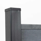 Side detail of a capped black post, top rail, and light gray composite fence board