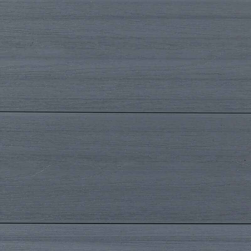 Close-up of light gray co-extrusion composite boards with fine horizontal wood grain