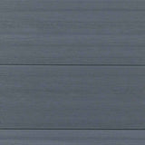 Close-up of light gray co-extrusion composite boards with fine horizontal wood grain