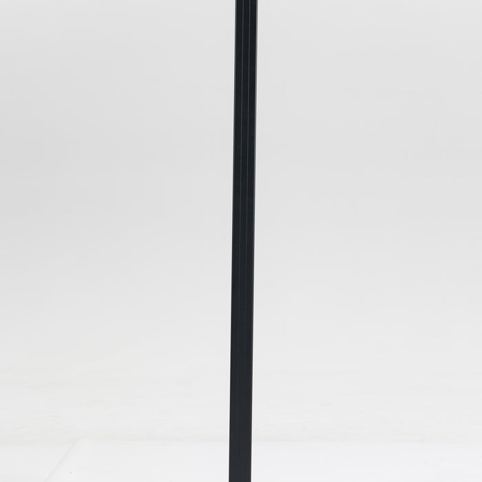 Tall black metal floor lamp with white cylindrical fabric shade