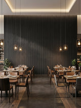 Restaurant dining area with a full-height Dark Smoky Oak fluted 3D accent wall