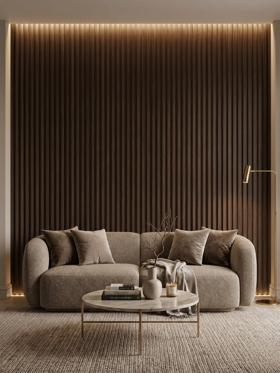 Dark Walnut Oak WPC fluted accent wall with integrated lighting behind a curved living room sofa