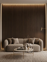 Dark Walnut Oak WPC fluted accent wall with integrated lighting behind a curved living room sofa