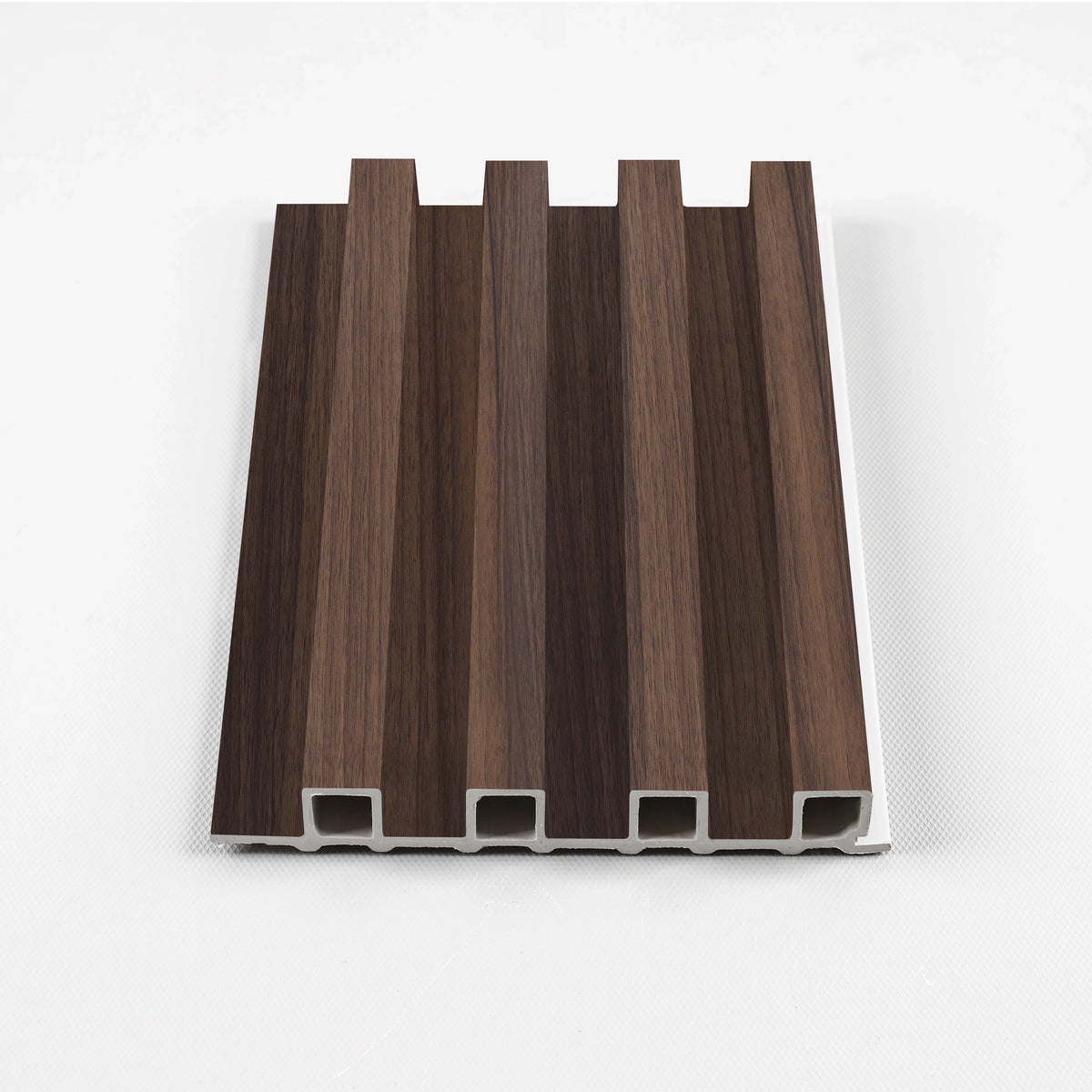 Dark Walnut Oak WPC fluted wall panel sample with rich brown wood grain