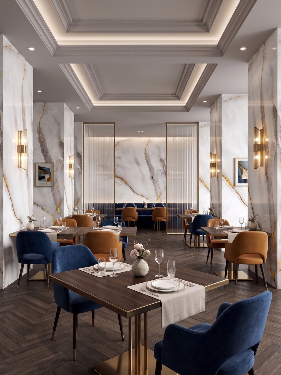 Empress Gold white marble-style PVC sheets with gold veining installed on walls and columns in an elegant restaurant