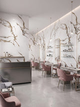 Ethereal Blush Marble PVC wall panels lining a bright salon with mirrors, display shelves, and blush pink chairs
