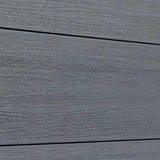 Close-up of light gray composite fence boards with wood-grain texture and horizontal joints