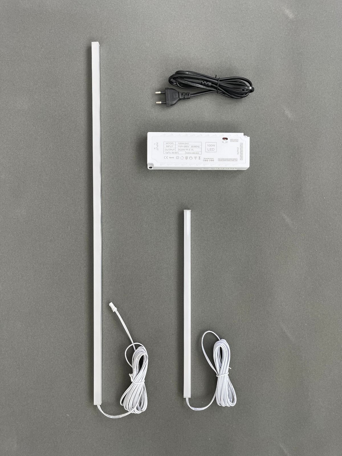 Two smart LED strip light bars with power adapter, plug and connecting cables