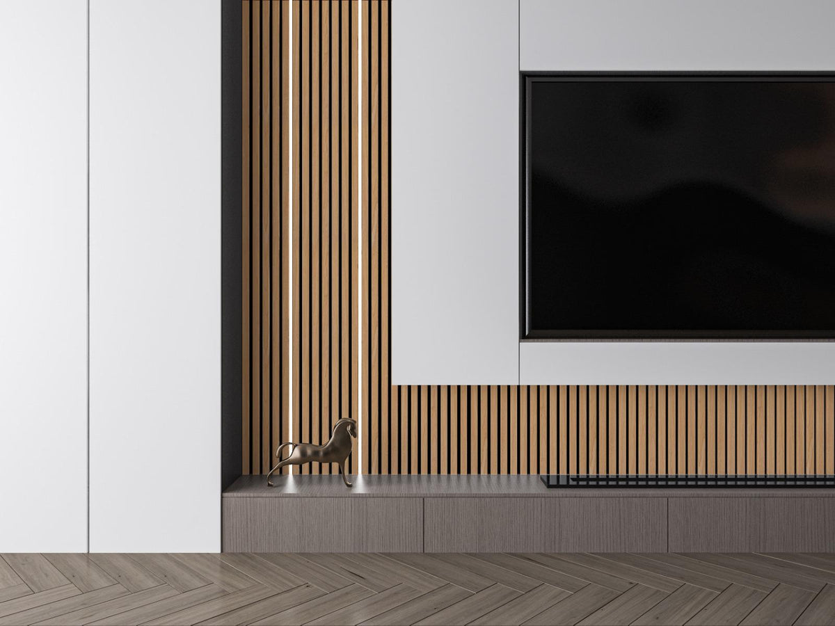 Wood-look acoustic slat wall panels framing a television in a minimalist living room