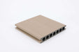 Light brown composite deck board with wood grain texture