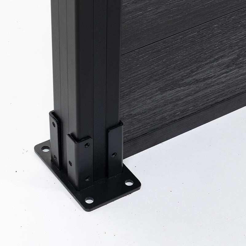 Close-up of a black fence post mounting plate and adjoining composite boards