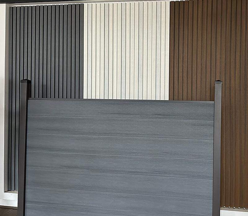 Light gray composite fence with wood grain texture