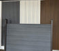 Light gray composite fence with wood grain texture