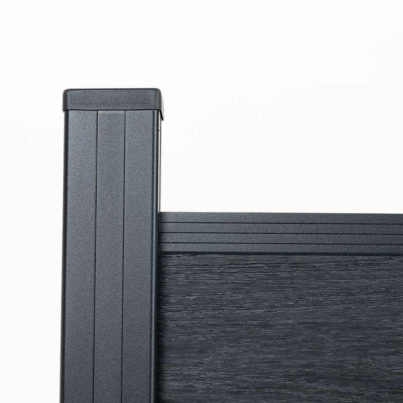 Black composite fence top corner with capped post, rail, and textured board