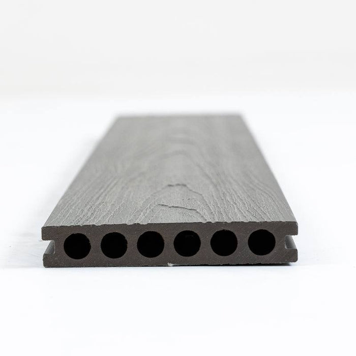 Dark gray wood-grain composite deck board with beveled edge