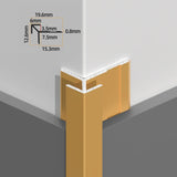 Gold aluminum outside corner trim fitted over wall panels with angular profile dimensions