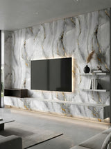 Modern TV wall clad in Golden Mirage PVC marble sheets with sweeping gray veining and gold accents
