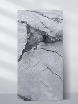 Upright 4 x 8 ft gray-brown marble-look PVC wall panel with dramatic dark veining