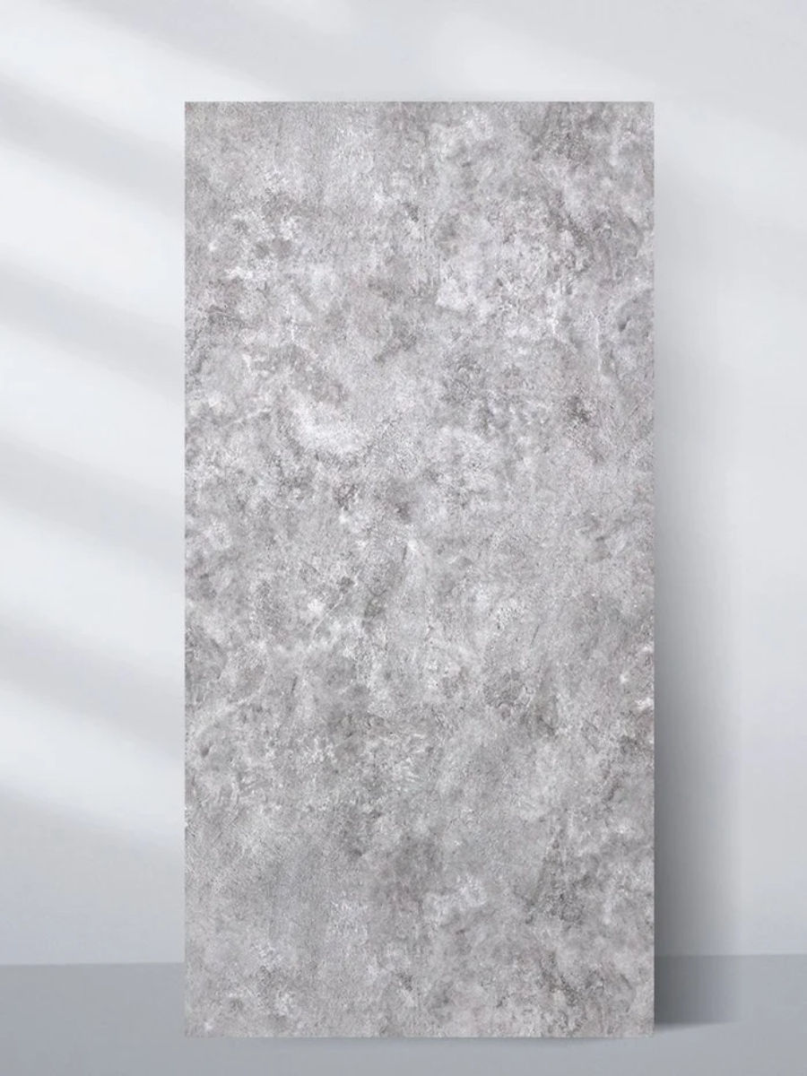Single gray stone-look PVC panel with a mottled rough texture