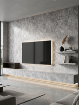 Rough-textured gray stone PVC panels on a media wall with mounted TV