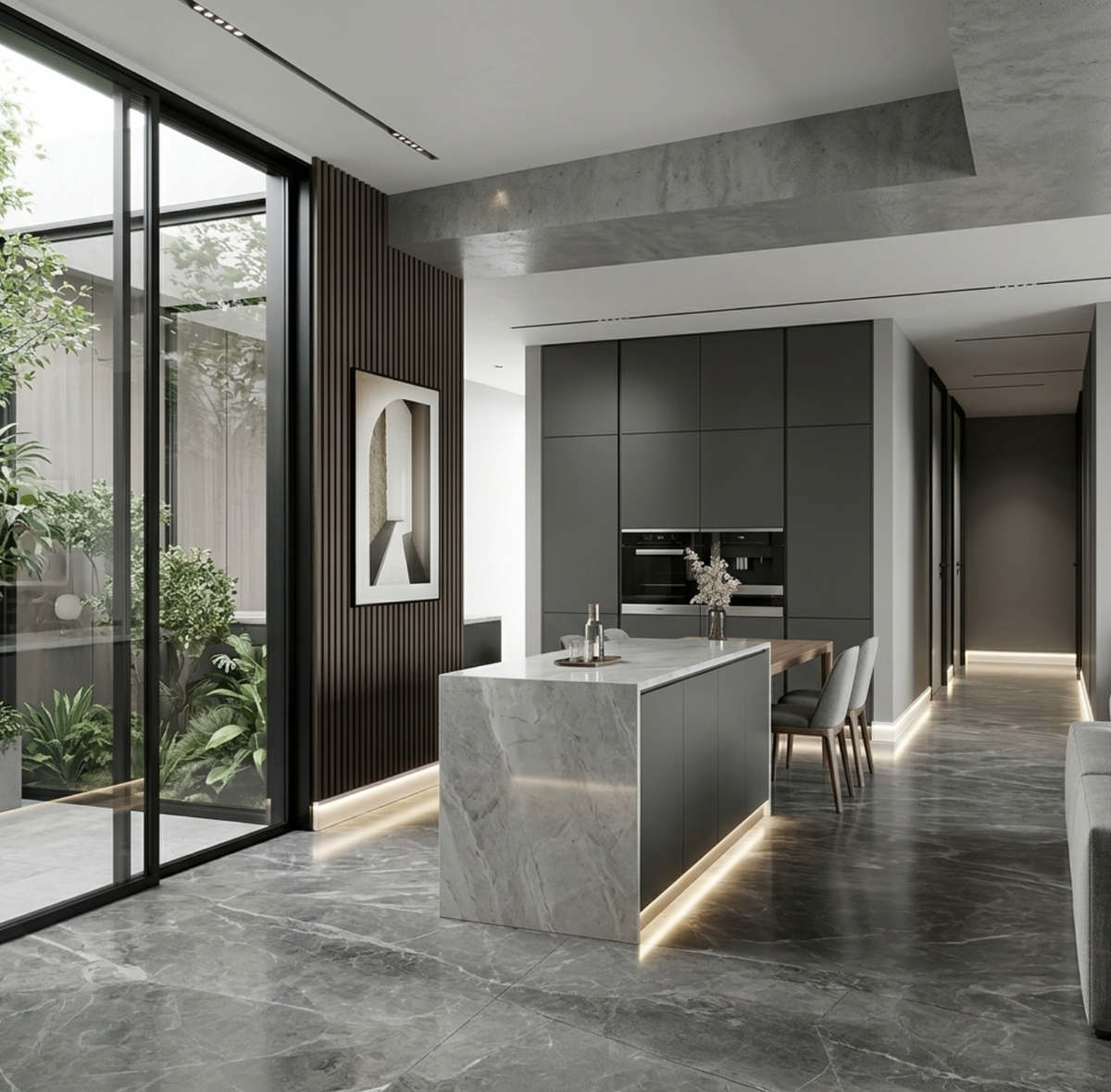 White aluminum LED baseboard molding casting warm perimeter light in a modern kitchen and hallway