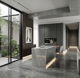 LED baseboard molding providing warm perimeter lighting in a contemporary kitchen and hallway