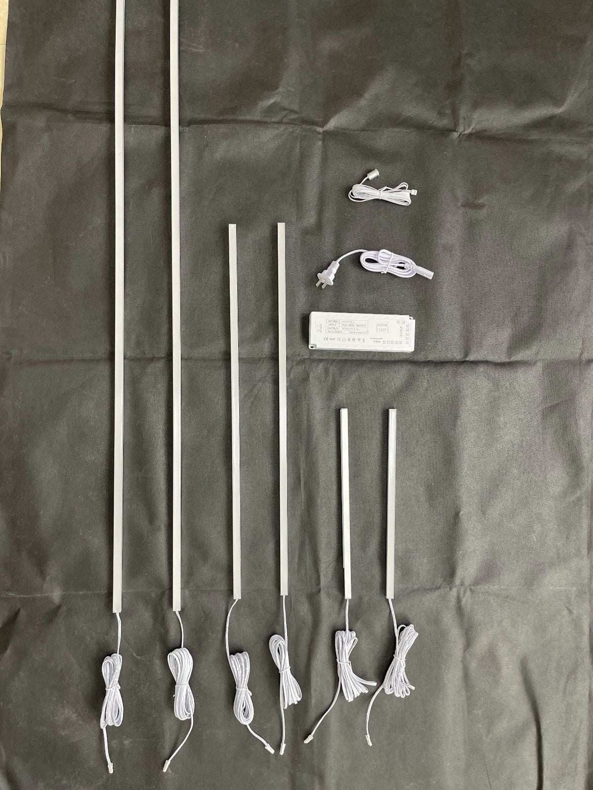 Six LED recessed light bars in assorted lengths with driver and connectors for WPC fluted panels