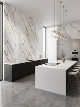 Luxe Gold Vein Marble PVC wall panels surrounding a modern kitchen with black cabinets and a white island