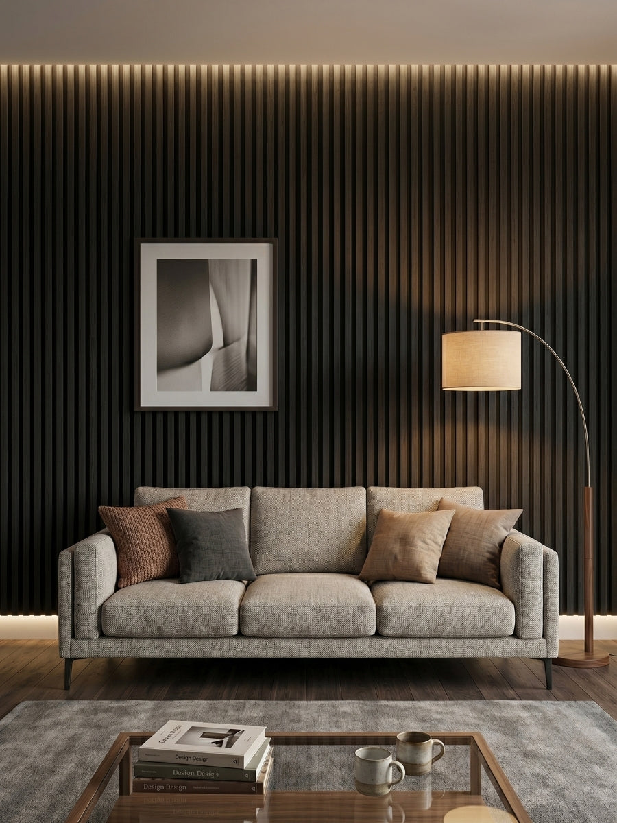 Luxe Noir black fluted wall panels behind a gray sofa in a modern living room