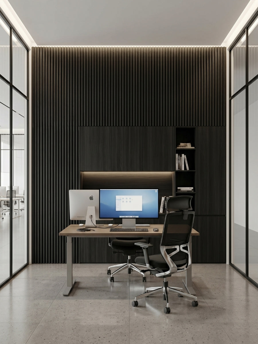 Luxe Noir black WPC fluted wall panels installed behind a desk in a glass-walled office