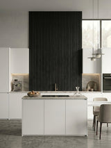 Luxe Noir WPC fluted 3D wall panels installed as a black kitchen accent wall
