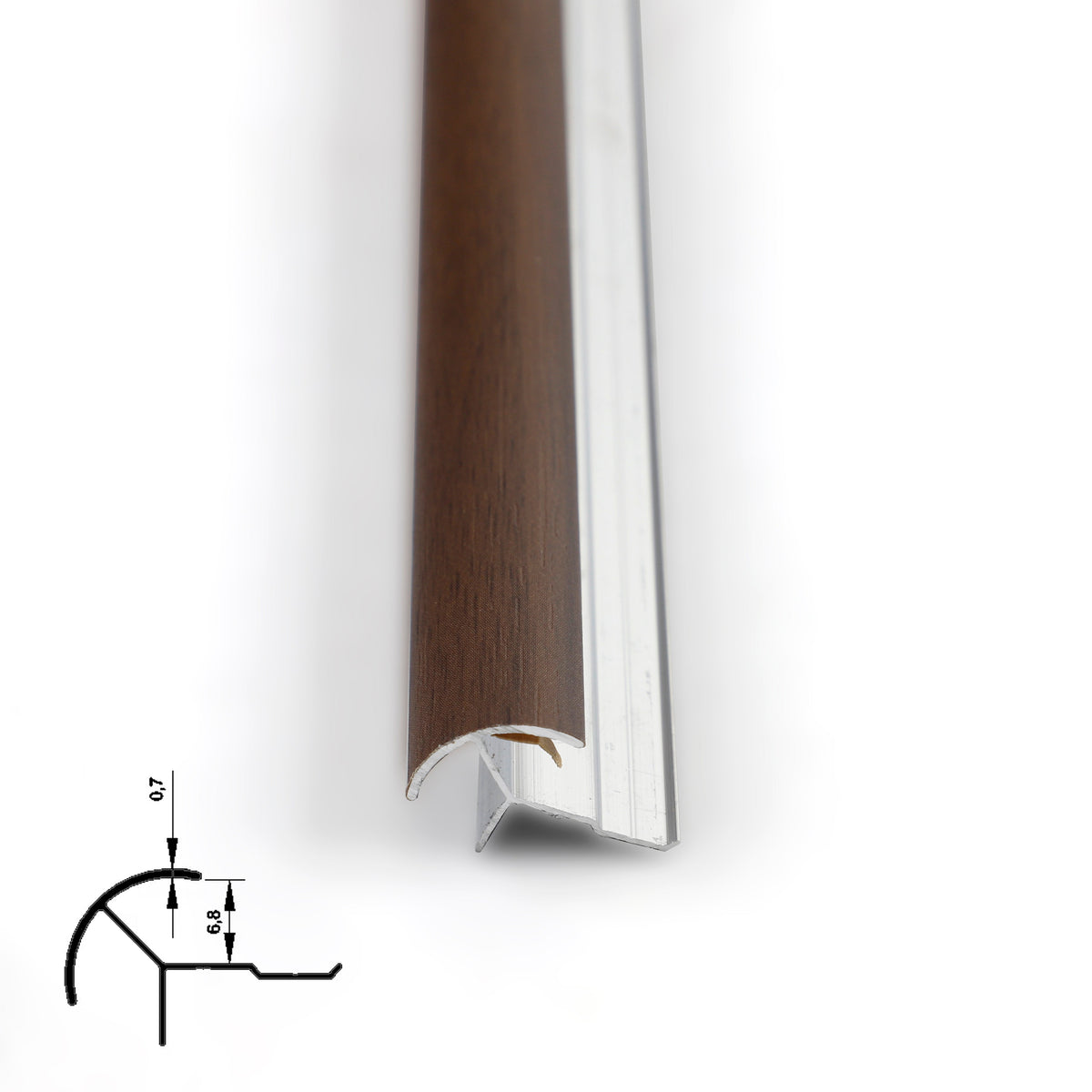 Close-up of dark brown 6.3mm aluminum outside corner trim showing the curved face and silver channel