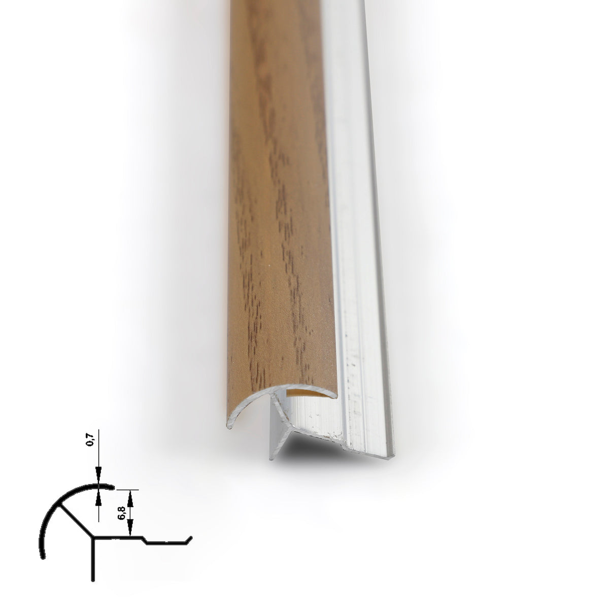 Close-up of light brown 6.3mm aluminum outside corner trim showing the wood-grain face and silver channel