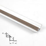 Close-up of taupe-brown wood-grain aluminum inside corner trim with silver edges and profile diagram