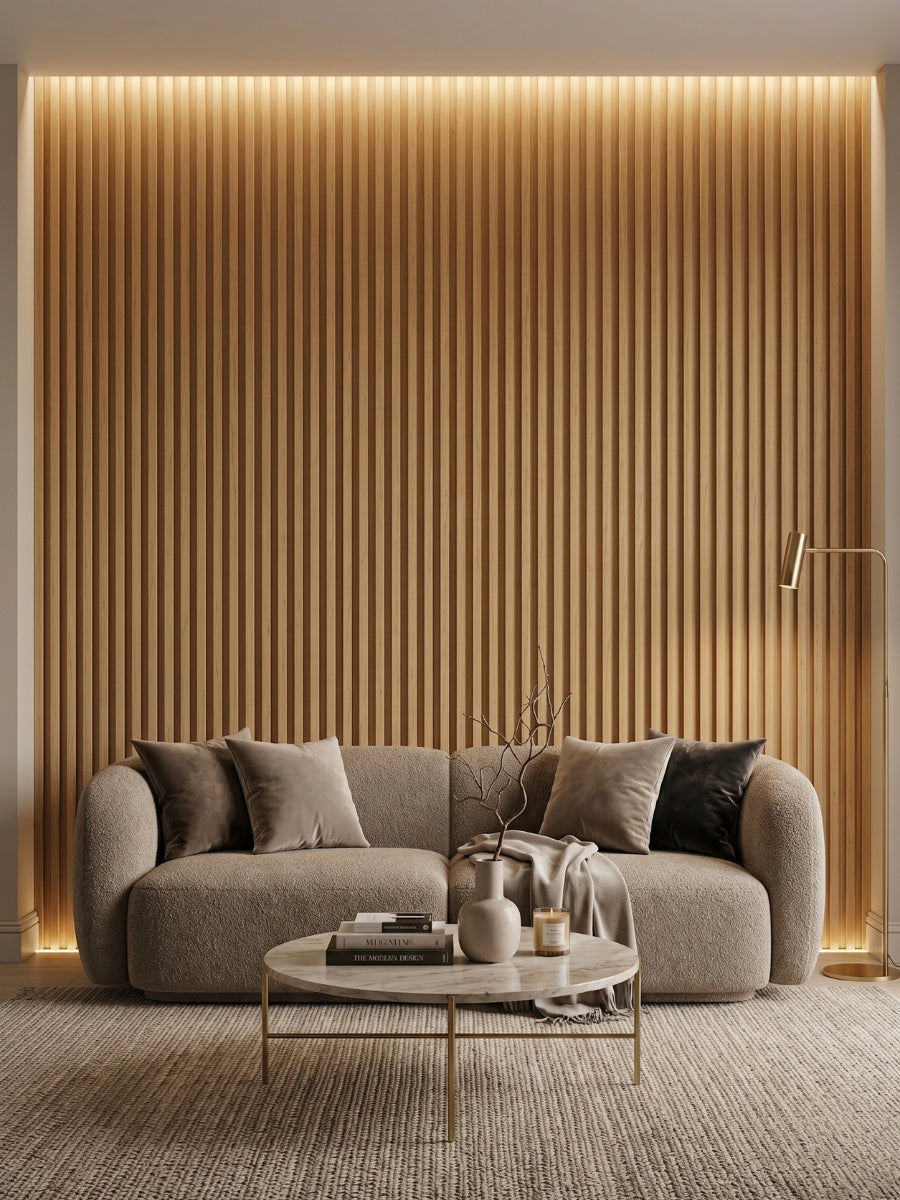 Illuminated Maple Slate fluted wall panel accent behind a curved living room sofa