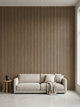 Floor-to-ceiling Maple Slate Black fluted wall panels behind a neutral sofa