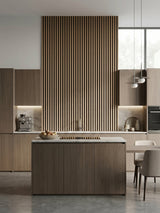Maple Slate Black fluted 3D panels forming a tall kitchen feature wall behind the island
