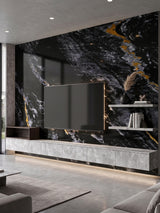 Black, gray and gold marble-pattern PVC panels installed behind a wall-mounted TV and floating console