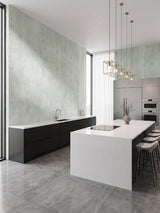 Pale green travertine-effect PVC wall panels in a contemporary kitchen