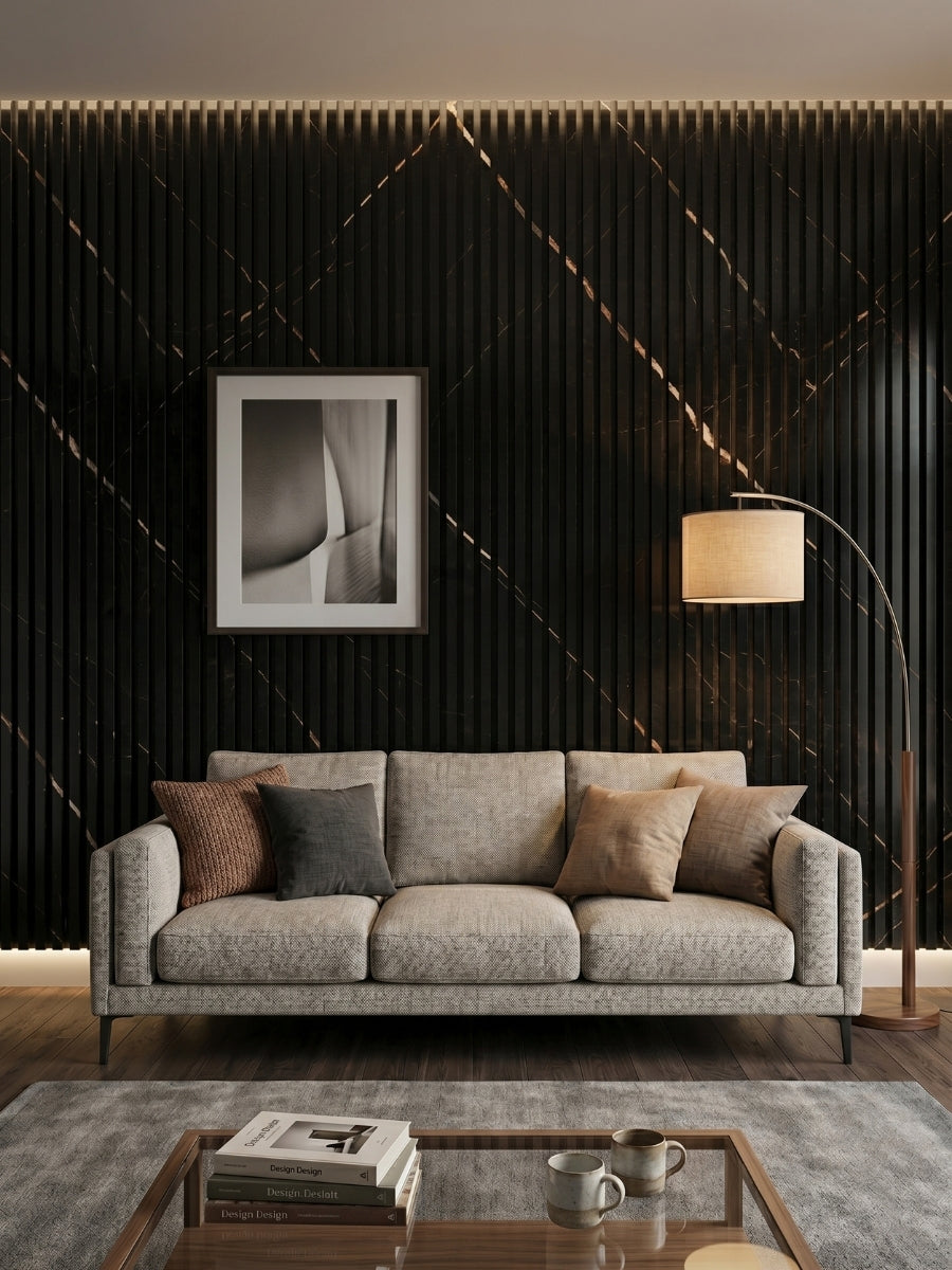 Noir Royale WPC fluted 3D wall panels installed behind a gray sofa in a modern living room