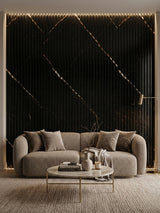 Black Noir Royale fluted wall panels with gold-toned diagonal veining behind a curved sofa