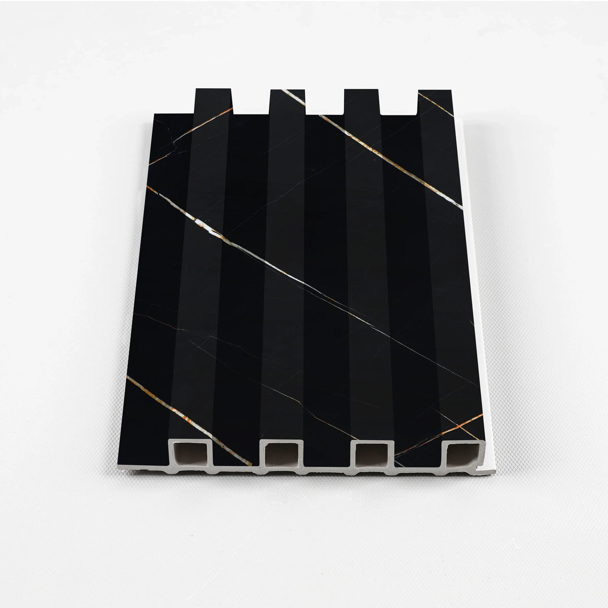 Noir Royale WPC fluted wall panel sample with black marble-look finish and fine gold veining